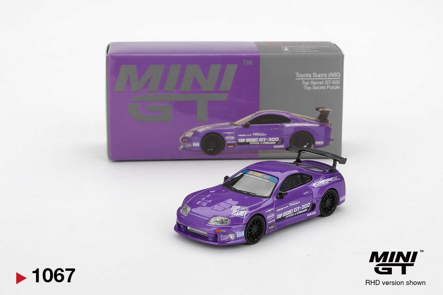 MINI GT #1067 — Toyota Supra (A80) Top Secret GT-300 Top Secret Purple