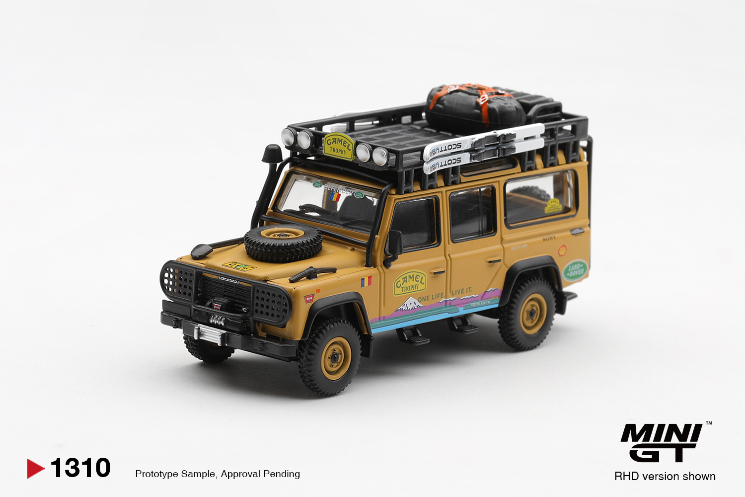MINI GT #1310 — Land Rover Defender 110 1998 Camel Trophy Tierra del Fuego CT.36 Romania