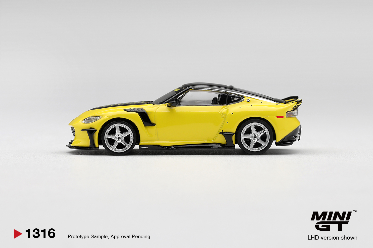 MINI GT #1316 — Nissan Z VeilSide FFZ400 Ikazuchi Yellow Nissan Fairlady Z VeilSide FFZ400 Ikazuchi Yellow RHD (MGT01316-R) - Image 4